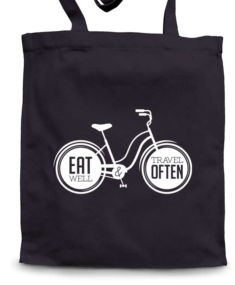 Shopping bags Bike and the words eat well travel often